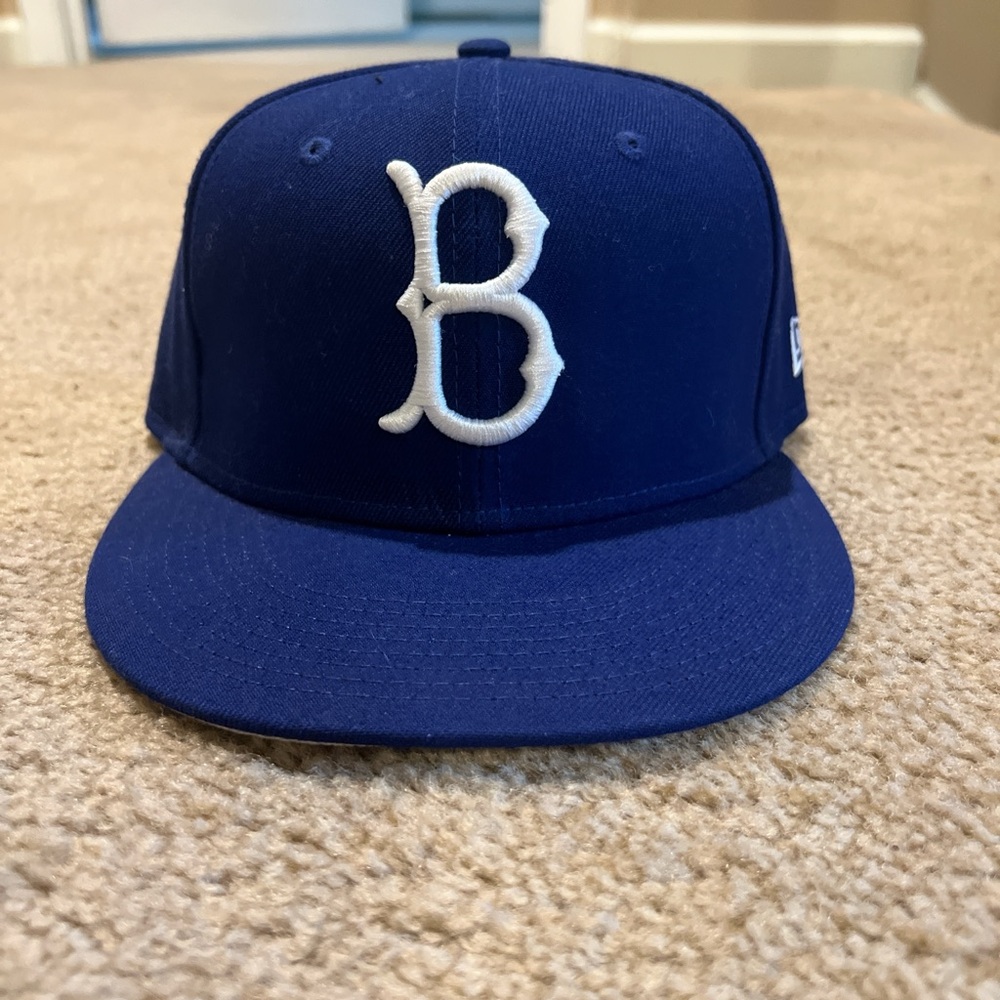 New Era Blue Baseball Cap with White Logo